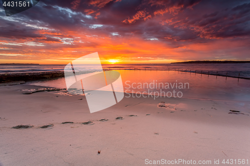 Image of Glorious sunrise and ocean rock pool beach Cronulla