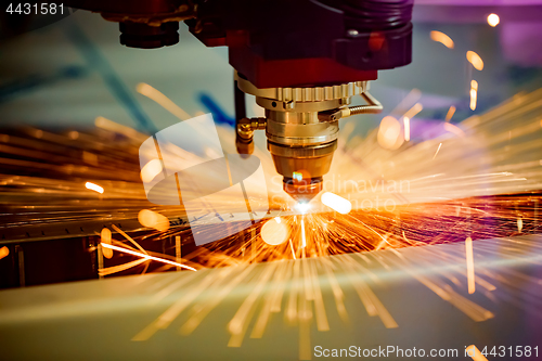 Image of CNC Laser cutting of metal, modern industrial technology.