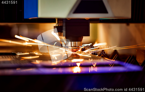 Image of CNC Laser cutting of metal, modern industrial technology.