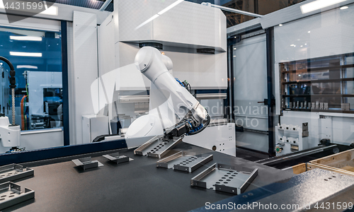 Image of Robotic Arm modern industrial technology. Automated production c