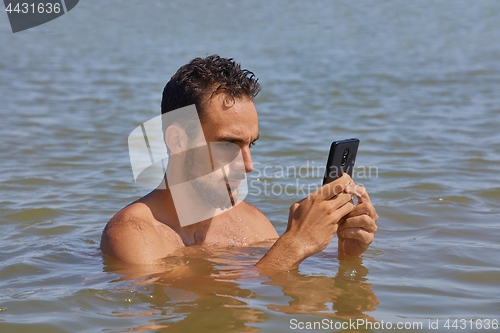 Image of Smartphone at the beach