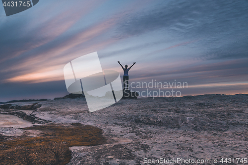 Image of Female arms outstretched to the sky at Lincolns Rock Blue Mountains