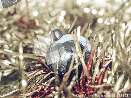 Image of Vintage looking Christmas bauble and tinsel