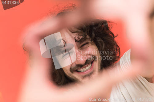 Image of young man with funny hair over color background