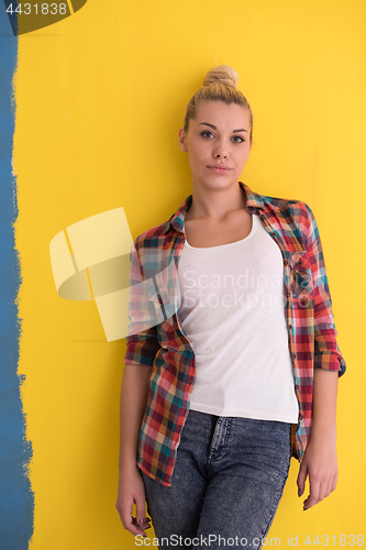 Image of young woman over color background