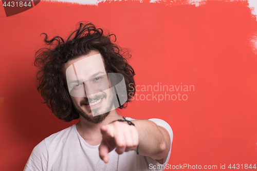 Image of young man with funny hair over color background