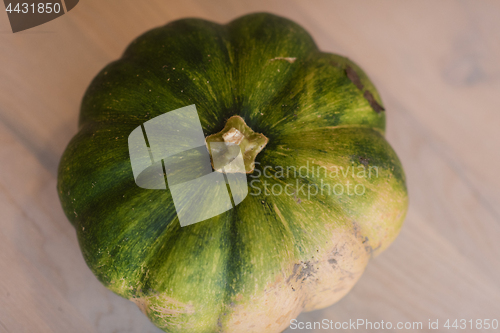 Image of pumpkin on a wooden table