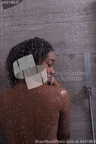 Image of African American woman in the shower