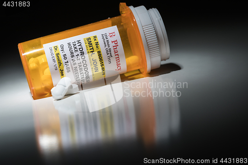 Image of Hydrocodone Pills and Prescription Bottle with Non Proprietary L