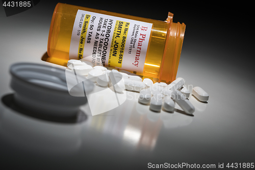 Image of Hydrocodone Pills and Prescription Bottle with Non Proprietary L