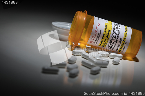 Image of Hydrocodone Pills and Prescription Bottle with Non Proprietary L