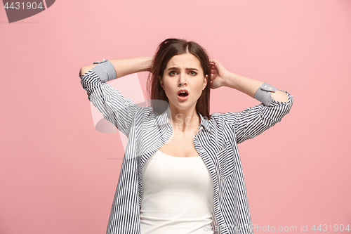 Image of Beautiful woman in stress isolated on pink