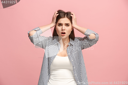 Image of Beautiful woman in stress isolated on pink