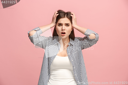 Image of Beautiful woman in stress isolated on pink