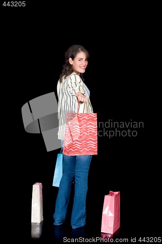 Image of Happy young woman shopping