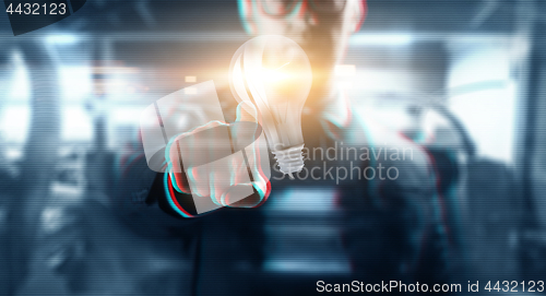 Image of close up of businessman with virtual light bulb