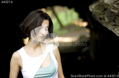 Image of unhappy woman in the cave