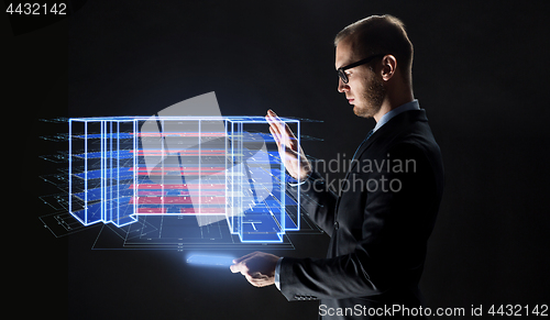 Image of man with tablet and virtual construction project