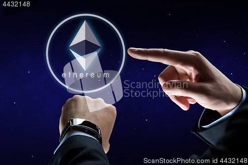 Image of hands with smart watch and ethereum hologram