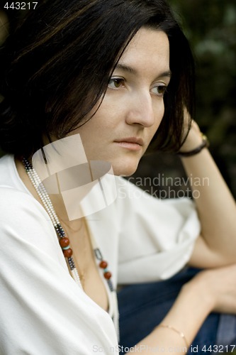 Image of unhappy brunet woman