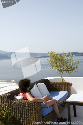 Image of tourist relaxing in santorini