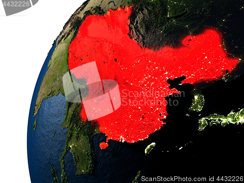 Image of China in red on Earth at night