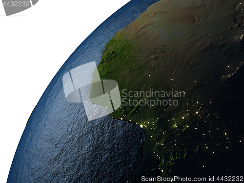 Image of Ghana in red on Earth at night