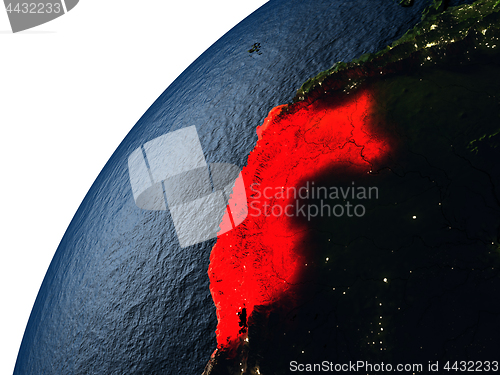 Image of Peru in red on Earth at night