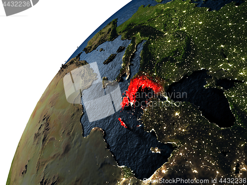 Image of Greece in red on Earth at night