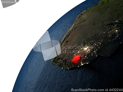 Image of Lesotho in red on Earth at night