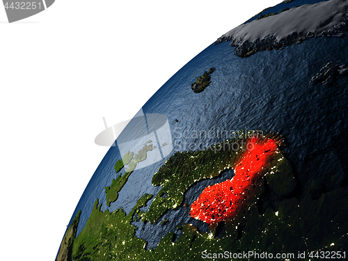 Image of Finland in red on Earth at night