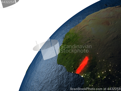 Image of Togo in red on Earth at night