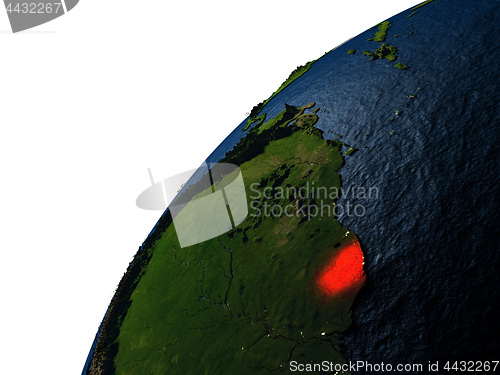 Image of French Guiana in red on Earth at night