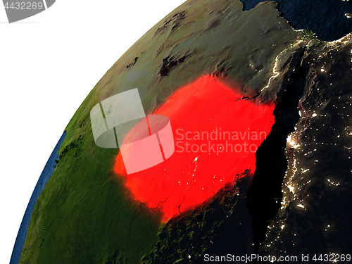 Image of Sudan in red on Earth at night