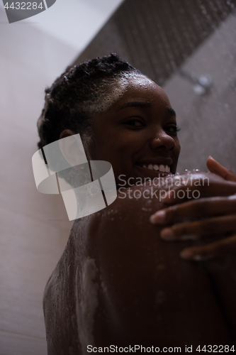 Image of African American woman in the shower