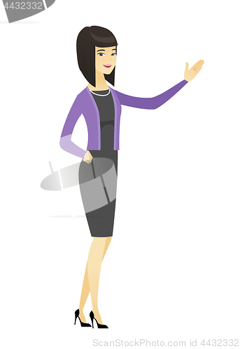 Image of Asian business woman showing a direction.