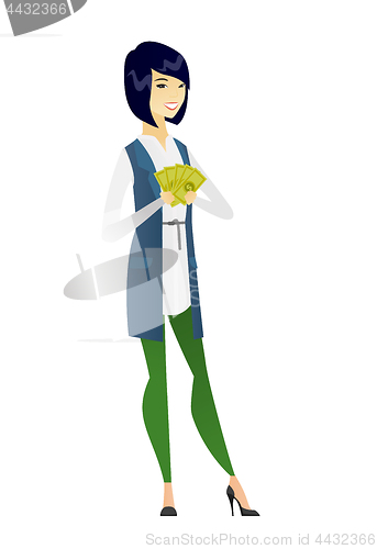 Image of Happy asian business woman holding money.