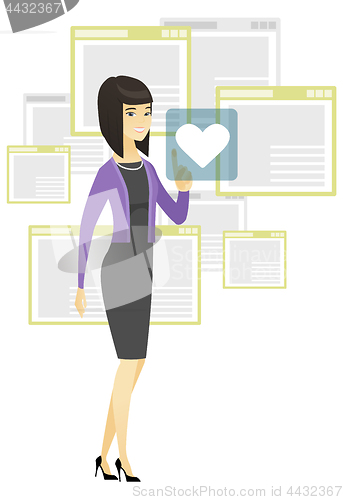 Image of Business woman pressing web button with heart.