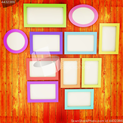 Image of Mock up picture frames on wood wall. 3d illustration. Vintage st