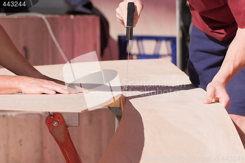 Image of Sawing Wood