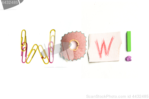 Image of The word wow created from office stationery.