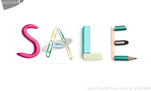 Image of The word sale created from office stationery.
