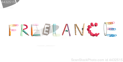 Image of The word freelance created from office stationery.