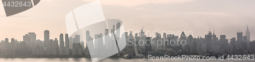 Image of New York City midtown Manhattan skyline panorama view from Boulevard East Old Glory Park over Hudson River.