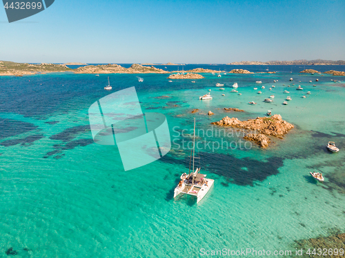 Image of Drone aerial view of catamaran sailing boat in Maddalena Archipelago, Sardinia, Italy.