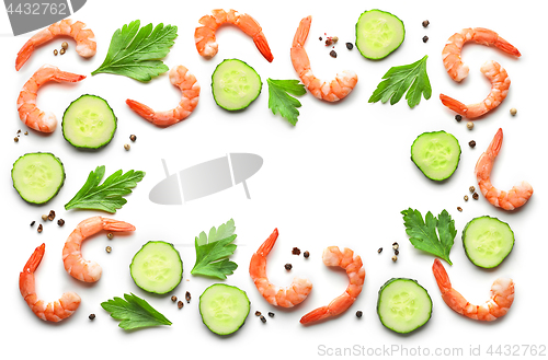 Image of frame of boiled prawns and fresh cucumber