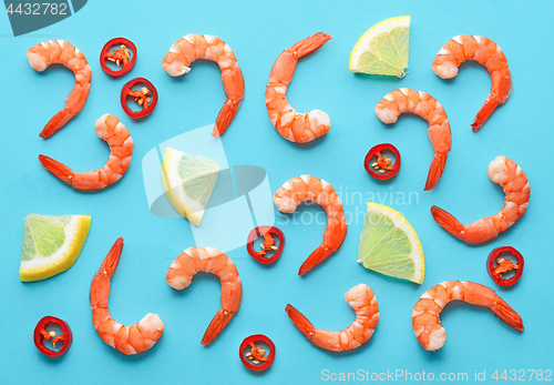 Image of pattern of prawns, lemon and chili