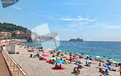 Image of people are sunbathing at Nice beach