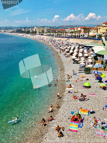 Image of people are sunbathing at Nice beach