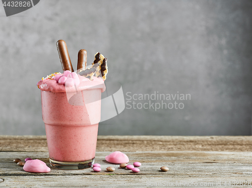 Image of glass of pink milkshake